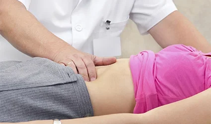 Treatment of abdominal bloating after surgery